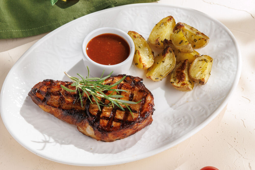 Pork loin with baked potatoes