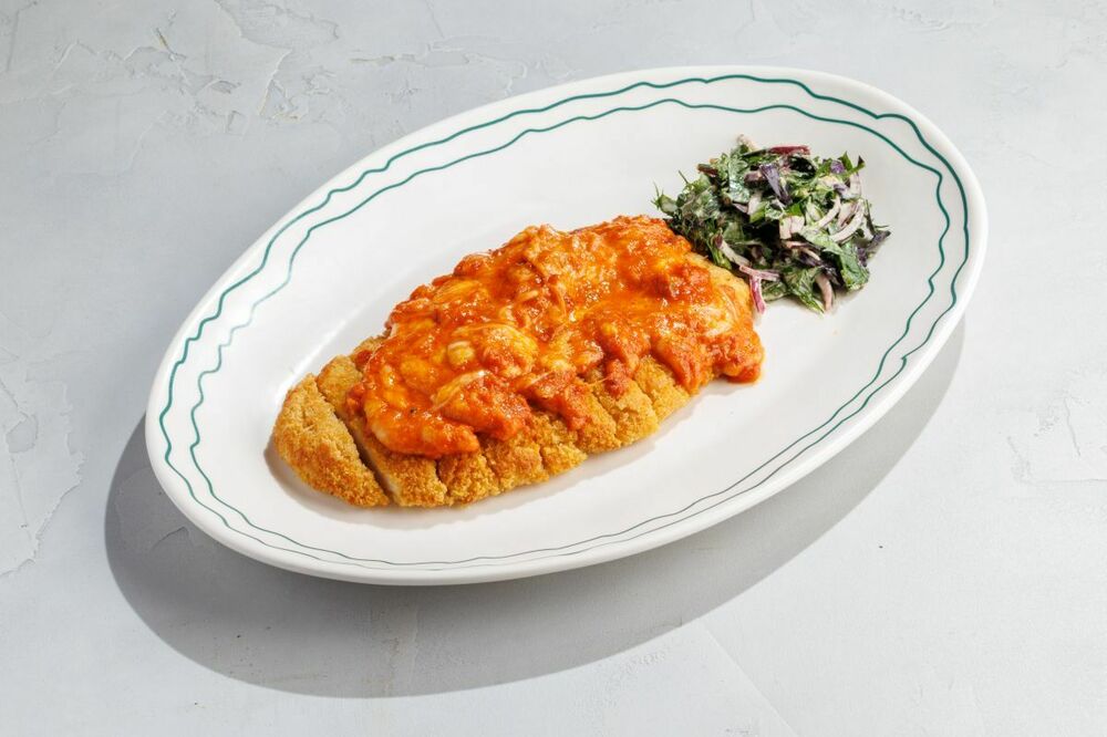  Chicken schnitzel with tomatoes and mozzarella