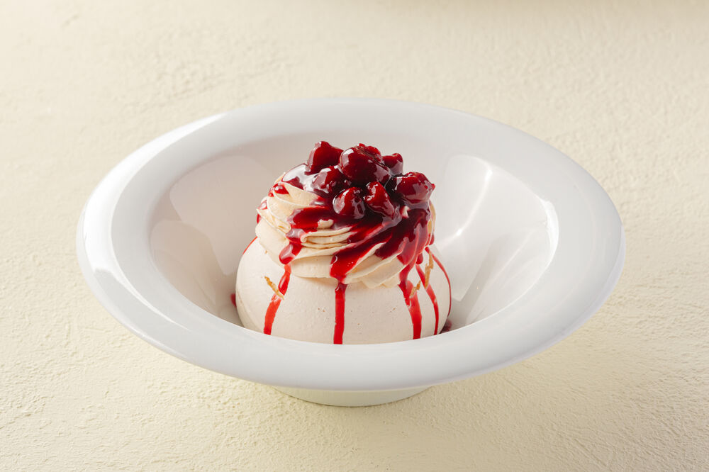 Anna Pavlova with cherry sauce