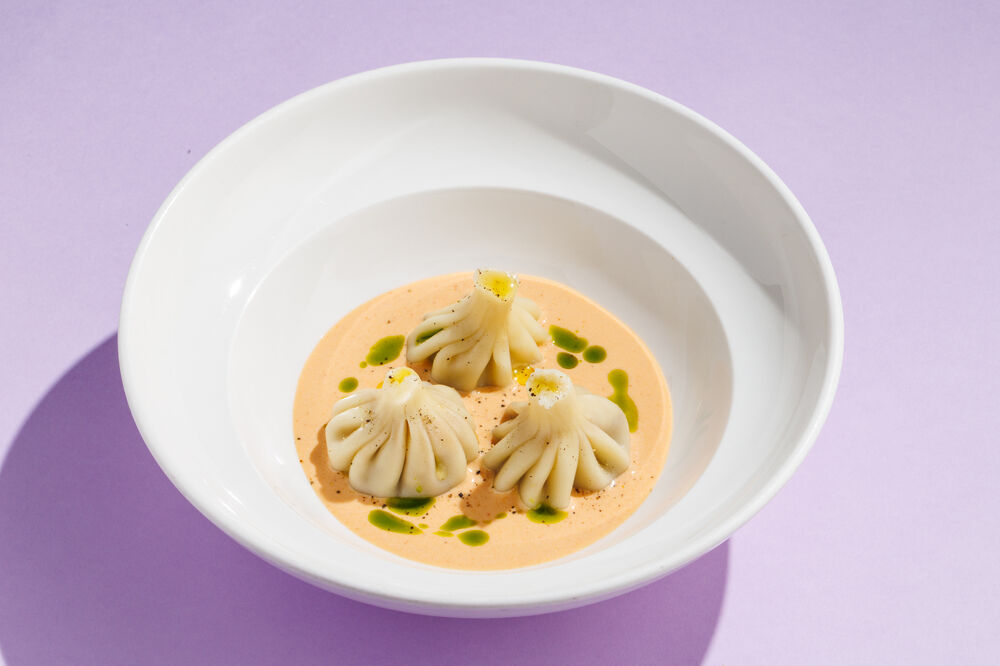 Mini-khinkali with seafood and Tom Yum sauce
