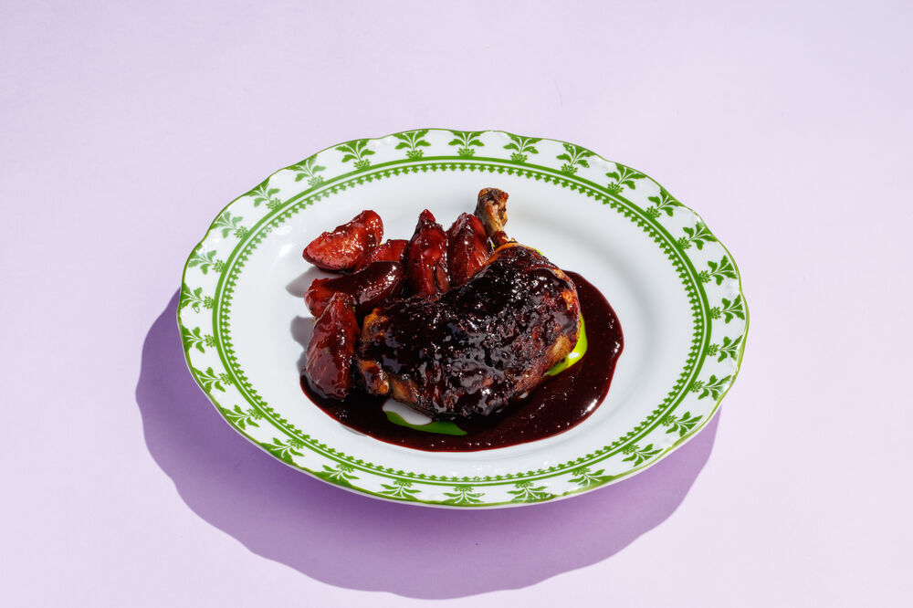 Bone-in chicken thigh with sweet tkemali and plum