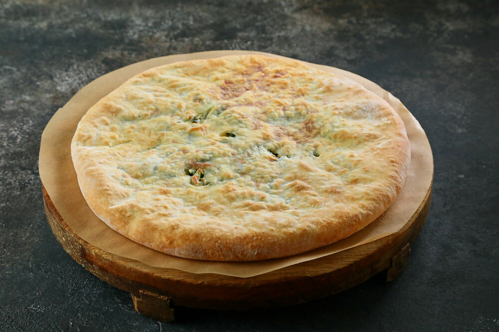 Khachapuri with spinach and cheese