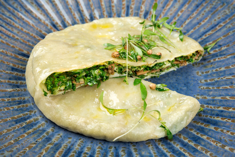 Kvari with mushrooms and cheese