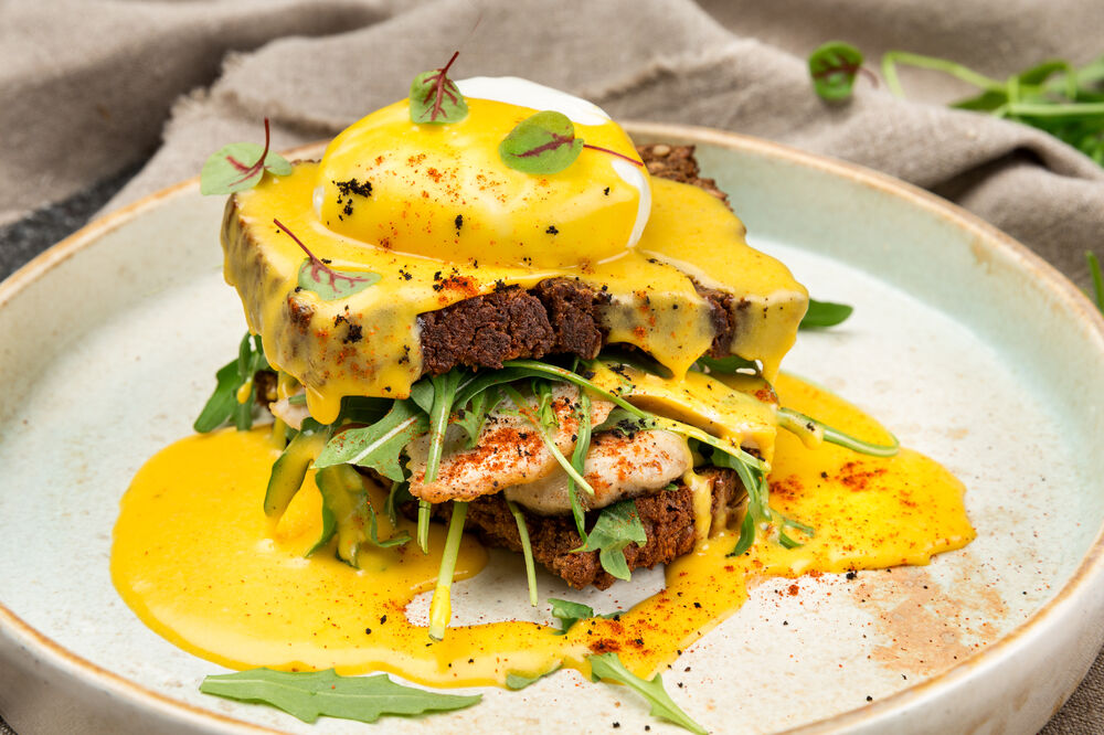 Egg Benedict with chicken and mushrooms