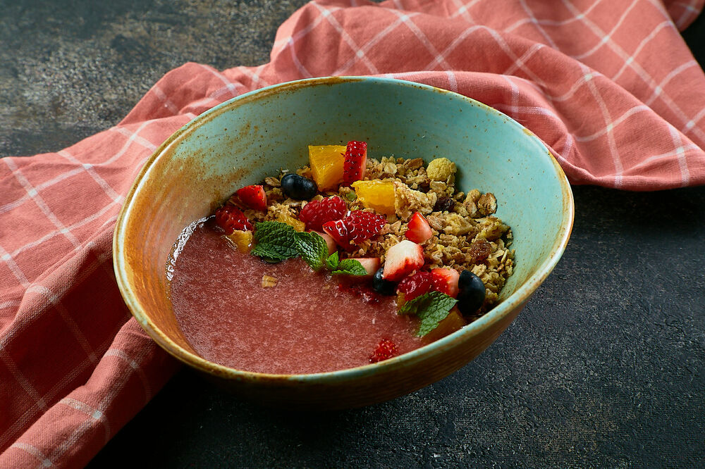 Granola with fruit and berry smoothie
