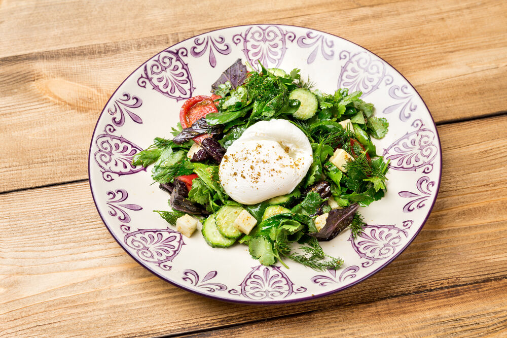 Salad with poached egg