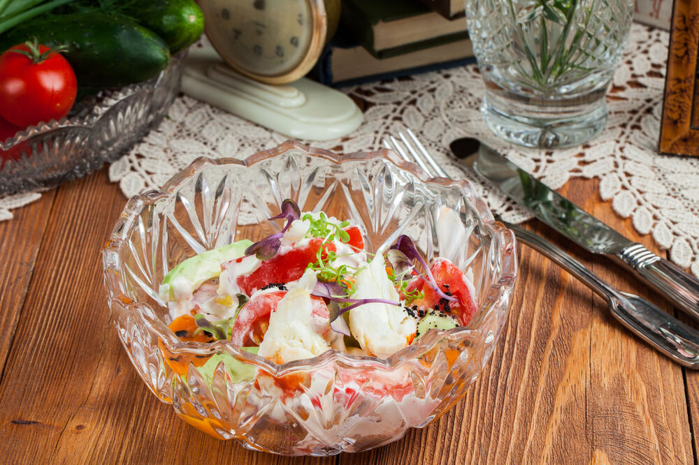 Tomato and king crab salad with sour cream