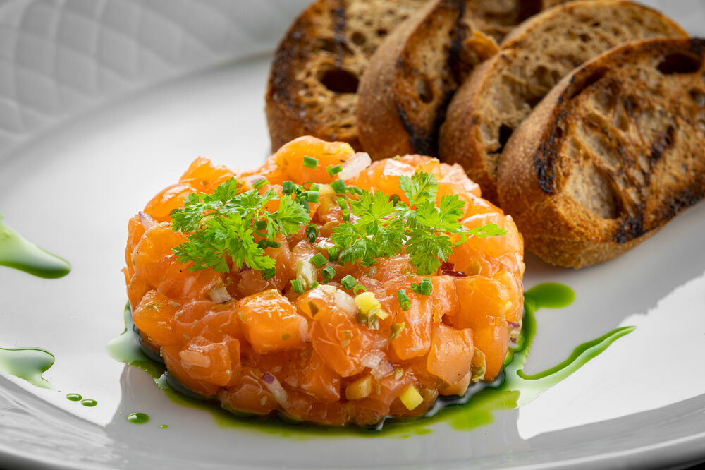 Salmon tartar with red caviar on promotion