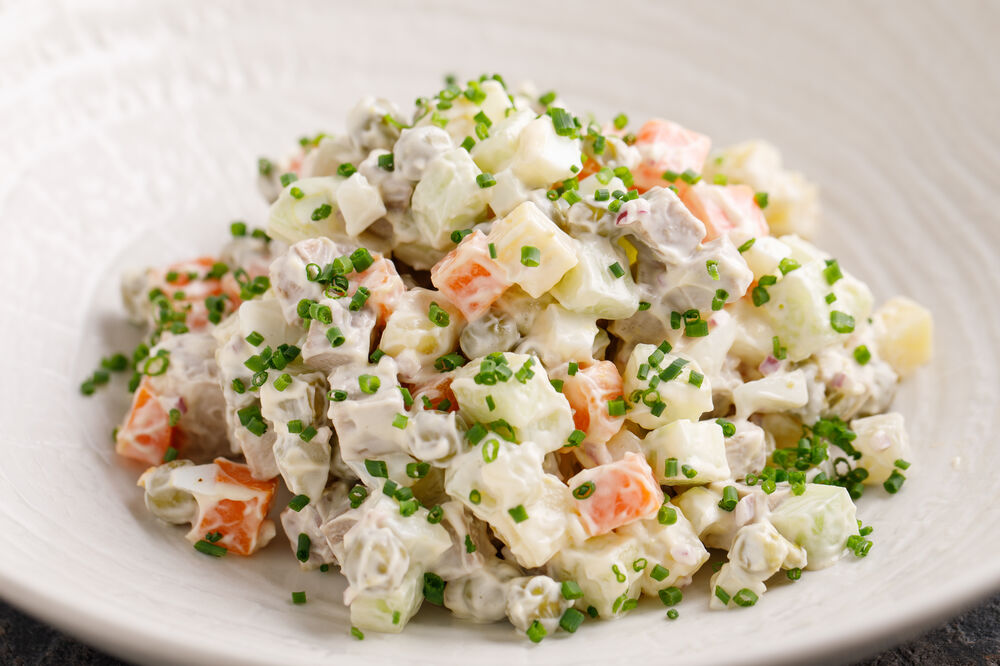 Olivier salad with tongue