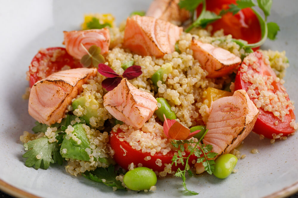 Quinoa salad with vegetables and salmon on promotion