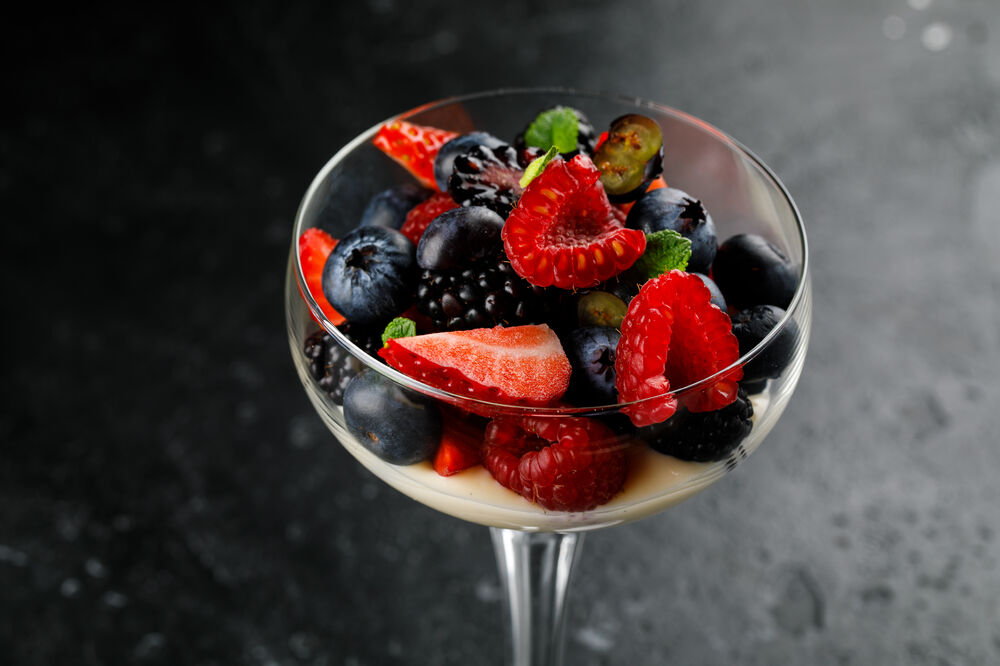 Mixed berries with vanilla sauce  on promotion