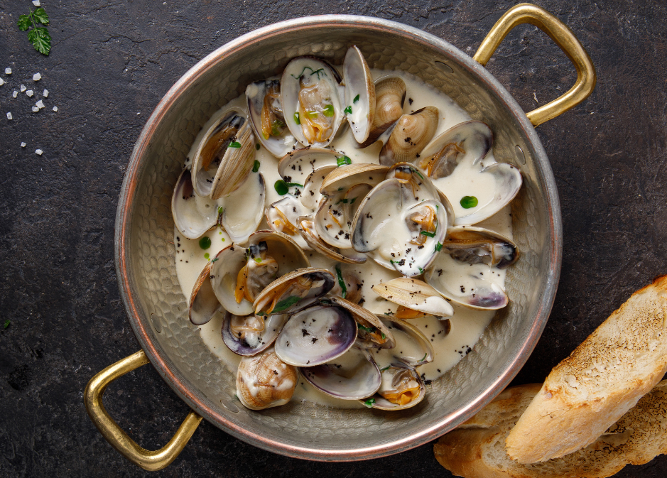 Sauteed clams in white cream on promotion