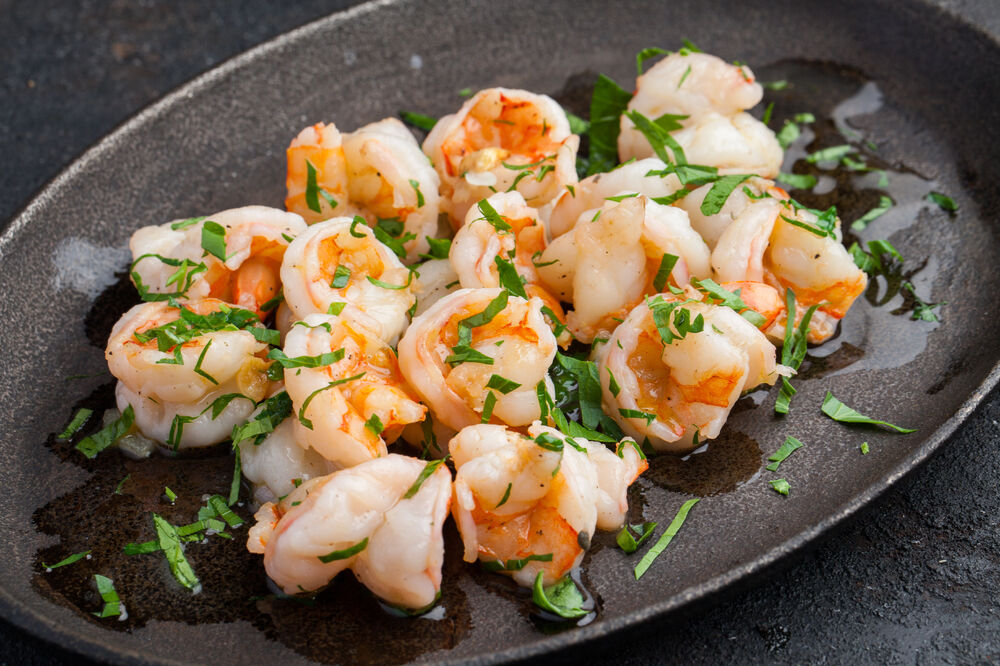 Shrimps with garlic and parsley on promotion